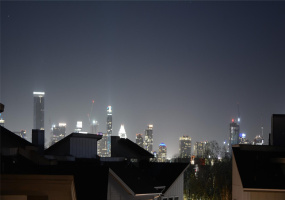 View of City Lights from Rooftop Terrace