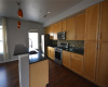 Kitchen Features granite countertops, stainless steel appliances including the Refrigerator