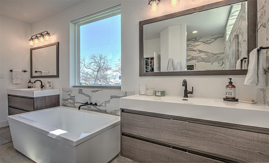 This beautiful modern soaking tub bath makes relaxation a dream to come home to