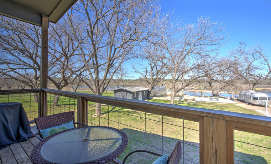 The guest house back deck easily lets your guests enjoy coffee or a glass of wine out on their own covered deck with lakebend views and natural habitat and wildlife 