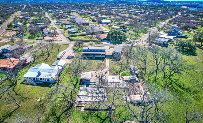 Aerial view of property; house is situated at the peak of the neighborhood