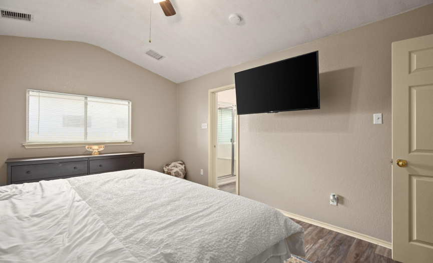 A serene haven, the primary bedroom is designed for relaxation and comfort.