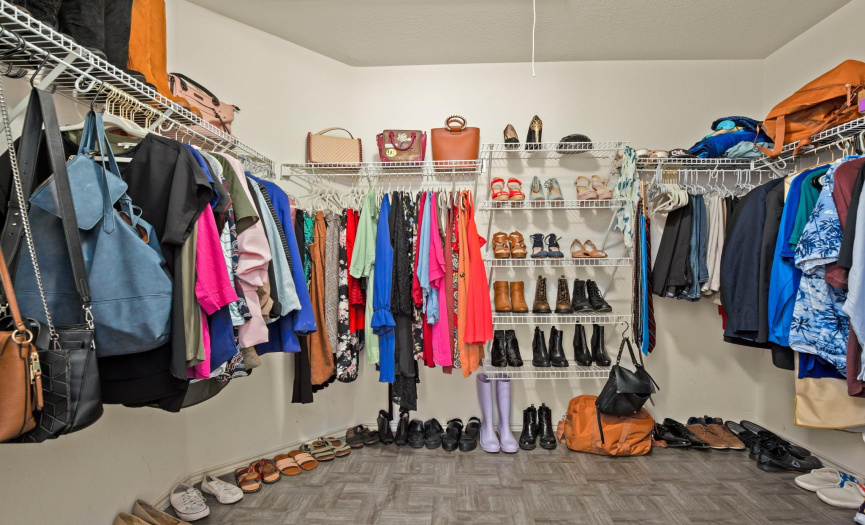 The spacious walk-in closet provides ample storage for your wardrobe and belongings.