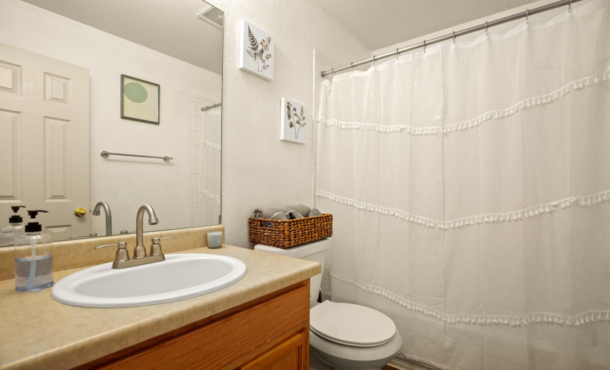 A clean and functional guest bathroom - perfect for accommodating family and friends.