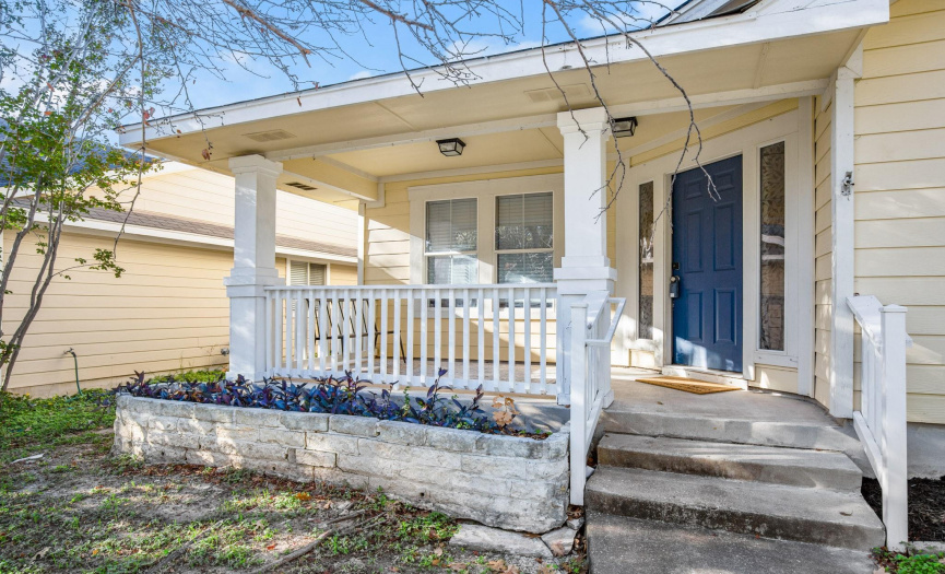 As you approach, you'll be captivated by the charming covered front porch, a welcoming spot to savor your morning coffee or unwind after a long day.