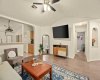The living room offers a spacious and comfortable area for relaxation and family gatherings.