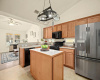 Abundant cabinetry in the kitchen ensures you have plenty of storage for all your culinary needs.