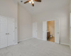 Primary bedroom has walk in closet. Don't miss the extra storage space behind the door!