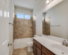 Upstairs secondary bathroom with tub