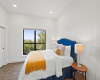 Spacious secondary bedroom with recessed lighting and a magnificent view
