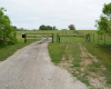Front entrance gate-654 gate to the right.Shared property easement straight ahead