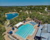 Lake Pointe's many amenities include a community pool and splash pad, fishing ponds, parks and a private dock on Lake Austin