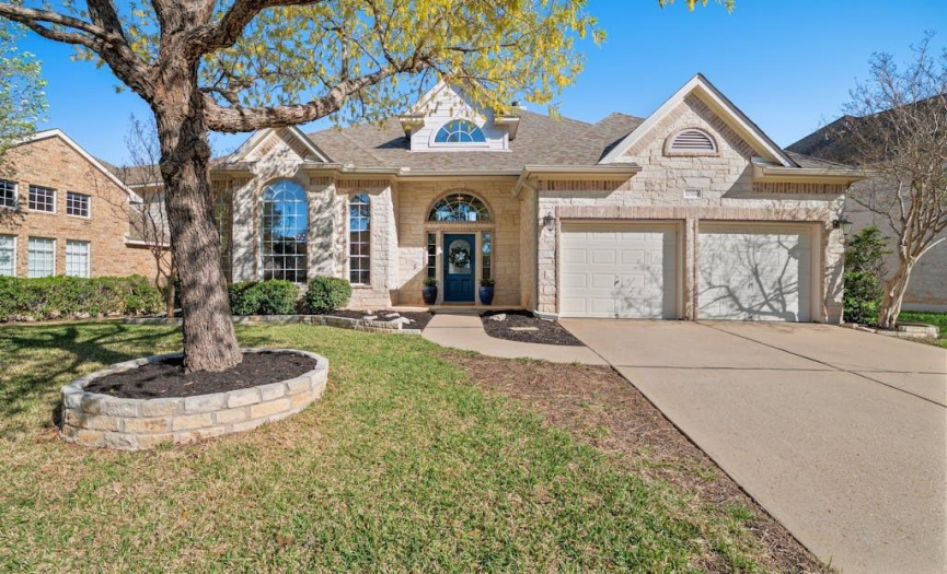 The cutest curb appeal! At the end of this friendly culdesac you'll find a walking path down to Lake Austin. 