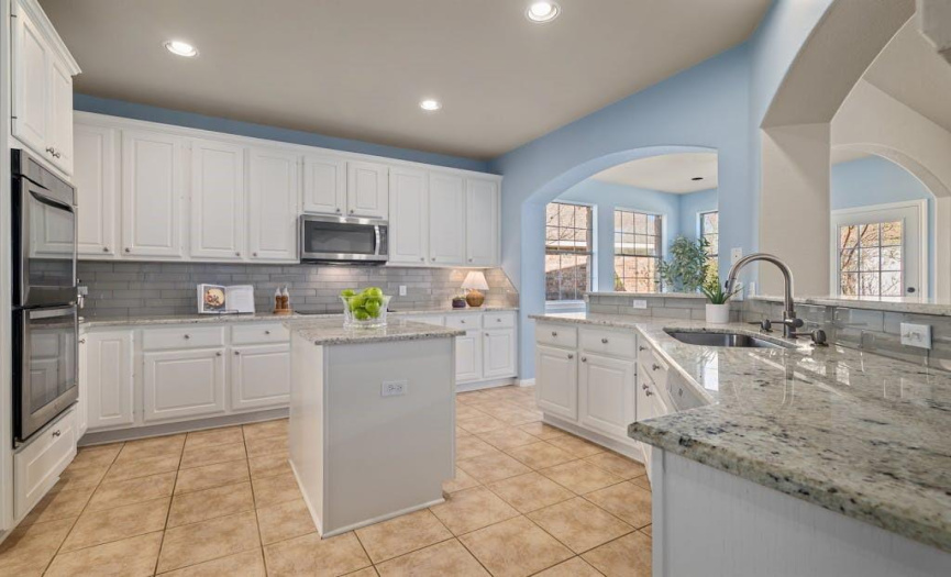 This beautifully updated kitchen is open to the dining room, breakfast room and living room.  You'll also find a large pantry just around the corner. 