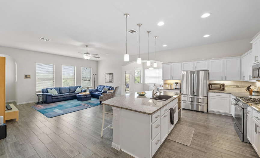 Generously spread across one thoughtfully designed level, this home includes a open concept making it easy to entertain guests while in the kitchen.
