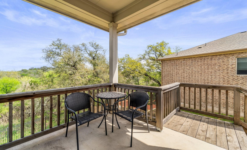 Whether enjoying a warm cup of coffee or a crisp glass of wine, the covered patio overlooking Onion Creek offers a sanctuary of peace and tranquility, where memories are made and moments cherished for a lifetime.