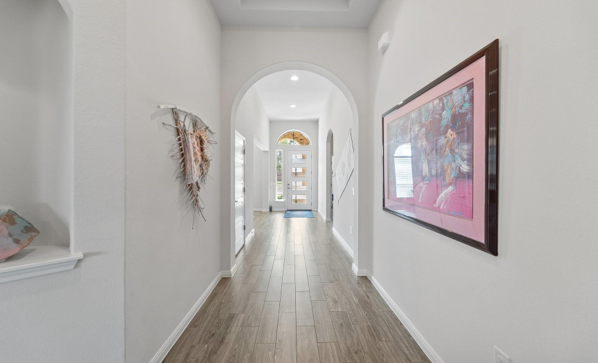 Prepare to be captivated by the charm and beaty of this remarkable home from the moment you enter through this charming front door.