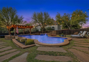This beautiful home, set on an expansive double lot with a park-like backyard, is an entertainer’s dream to enjoy for many months out of the year