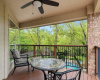 Balcony off the game room is a great spot for birds view of gorgeous backyard.