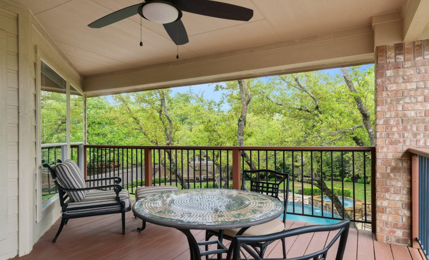 Balcony off the game room is a great spot for birds view of gorgeous backyard.