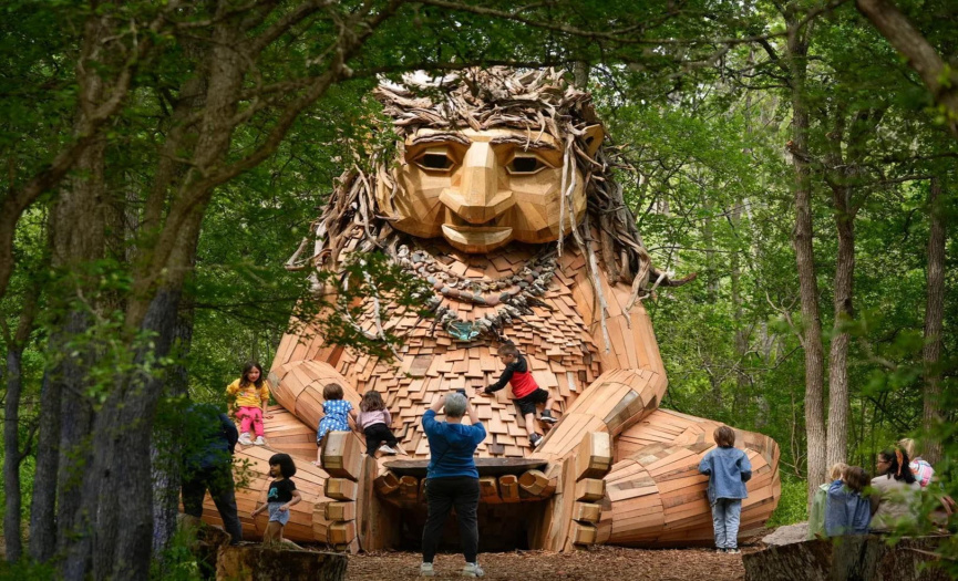 Pease Park’s newest art installation is tucked away in the woods, but she’s hard to miss. Malin is an 18-foot-tall troll made of local and repurposed wood by artist Thomas Dambo.
