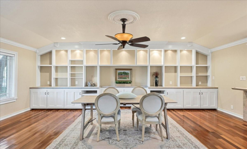 The dining room has a wall of built-ins for all of your special things you use to entertain!
