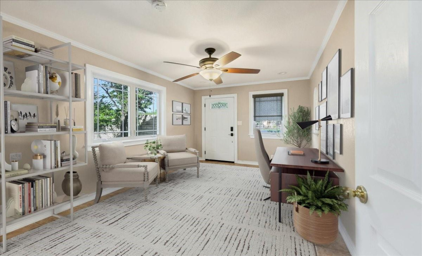 This is one of the living spaces that features a separate entrance to the driveway.  This could be used for an office or another bedroom.  This room is virtually staged.