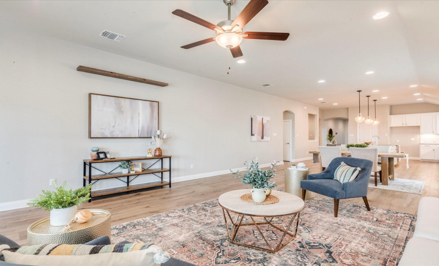 The luminous open great room floor plan makes it easy to stay connected with friends and family throughout the main living area.