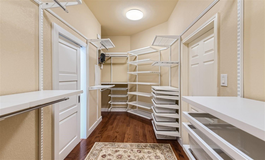 Super efficient master closet with tons of storage