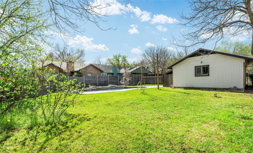 Situated on an oversized half-acre lot, this home boasts a large backyard with plenty of space to play and grow.
