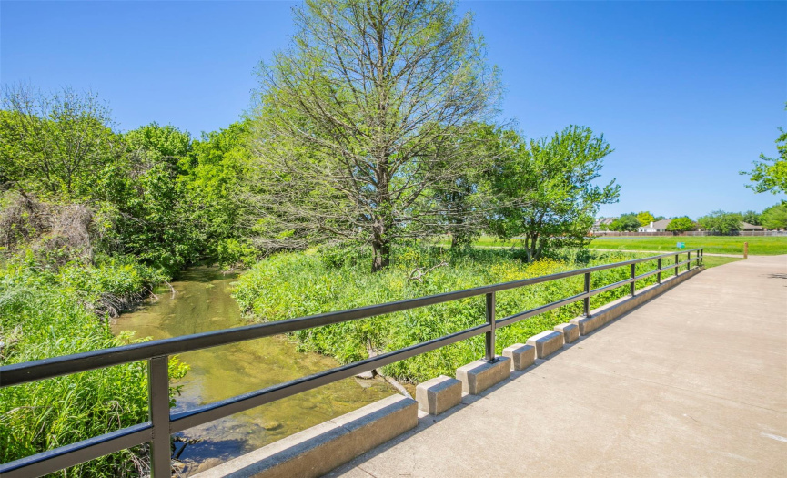 Gilliland Creek runs along your walking path and the gentle sound of water provides a great audio backdrop for your evening stroll.  Gilliland Public Pool is just 15 minutes away. 