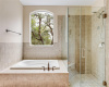 The garden tub and shower.