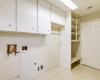 Ample storage in this utility room on both sides