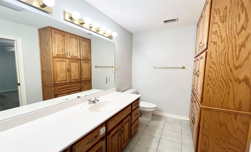 Primary Bathroom offers a walk-in shower 