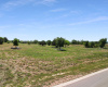 View from the front.  There are several build sites on this acreage for your dream home.