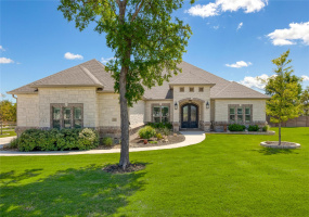 Welcome to this exquisite custom-designed home, nestled on a sprawling acre of land.