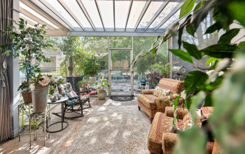Screened porch really is an extension of the home...bringing the outdoors in.