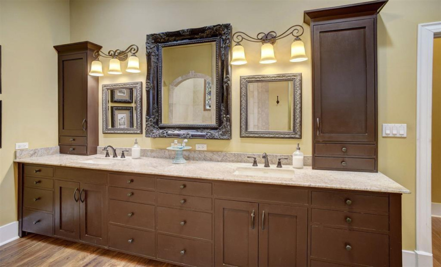 Plenty of space with two sinks in the custom built vanity in the primary bath 