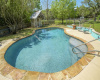 Pool has ample decking around it for sunning and relaxing, is also fully fenced