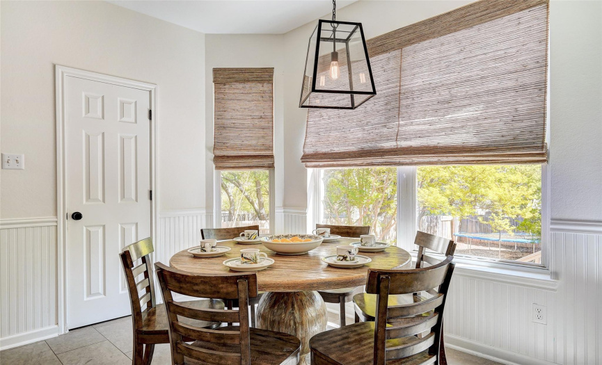 The breakfast nook is the perfect size for starting your mornings off right with a quick bite or a casual dinner at the end of the day... or maybe just a quiet cup of coffee and solitude, taking in the gorgeous, mature oaks with their gorgeous bright green canopies ablaze with color. 