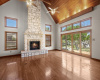 LARGE OPEN LIVING WITH OAK FLOORING.