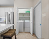 Dedicated laundry closet in unit makes laundry a breeze. 