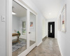 GLass doors lead to 4 th bedroom/study or home office