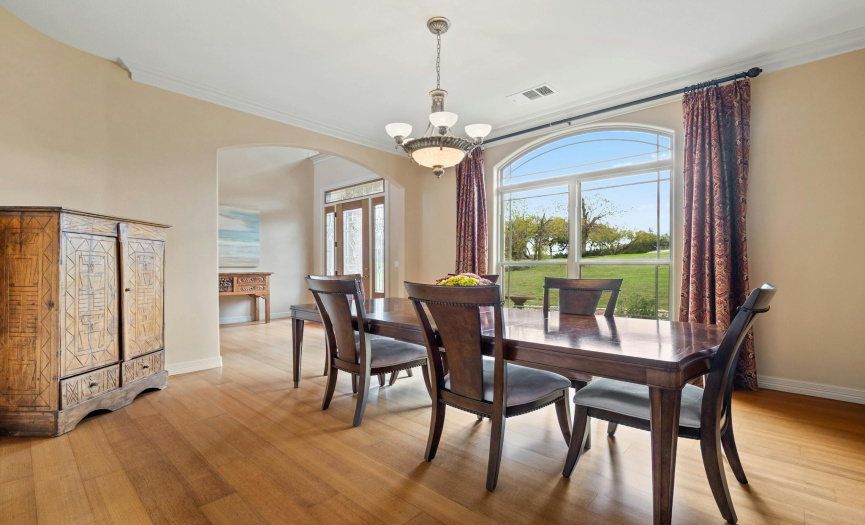 Savor culinary delights and engaging conversation in this sophisticated formal dining space, sure to impress any guest