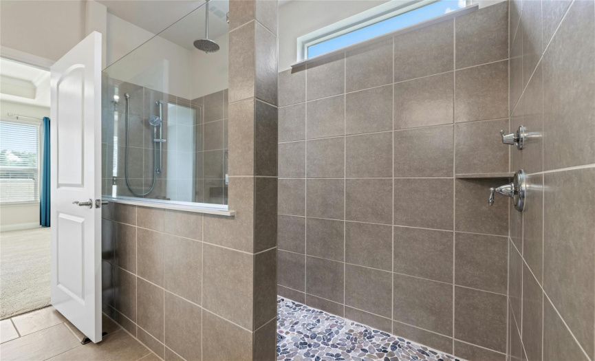 Enjoy a spa-like, walk-in shower in the main bath!