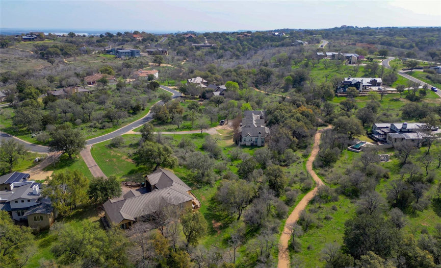 Lot is nestled between 2 gorgeous custom homes!