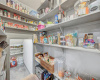 This is not your ordinary pantry! This pantry has space to be organized and to store bulky items out of the way.