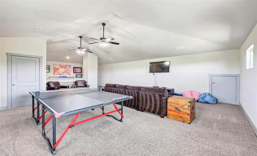 Ping pong, video games, or movies...enjoy one or all of these! In addition, even MORE storage in the door on the left that leads to walk-in storage.