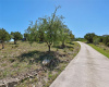 This private driveway takes you to a gorgeous hill country home!