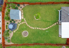 Want a backyard retreat on .21 acres?    Professionally landscaped by local Texas landscape design firm, Agave LD.